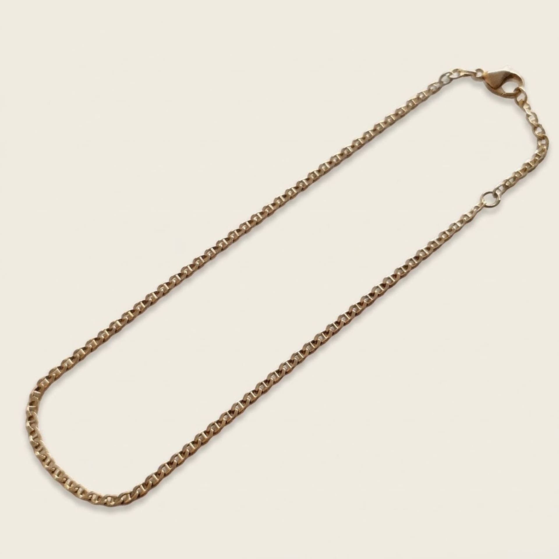 Anklet with curb link pattern in 333 8 KT yellow gold — photo 1 of 7