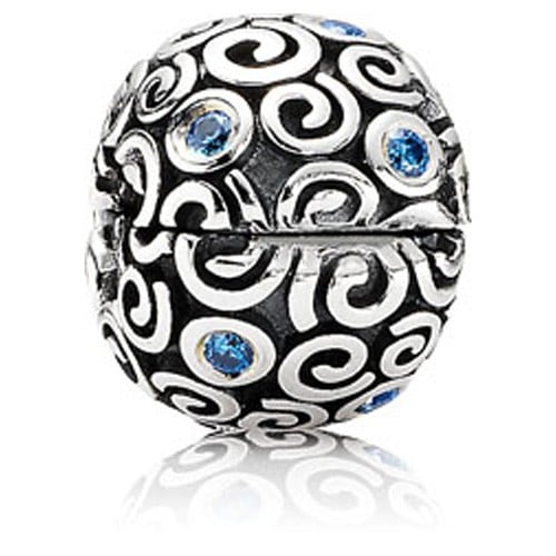 Abstract silver clip with blue cubic zirconia