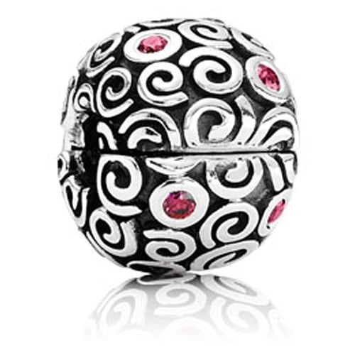 Abstract silver clip with red cubic zirconia